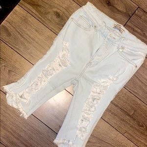 Destroyed denim Bermuda shorts